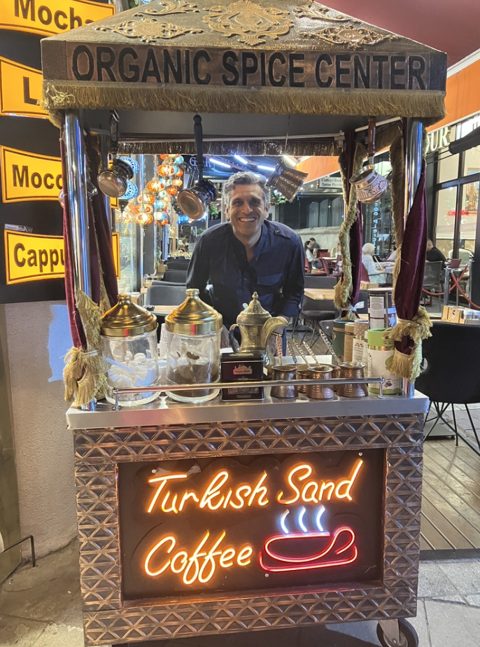 Stylized blue duotone portrait of a woman with long hair facing slightly backward